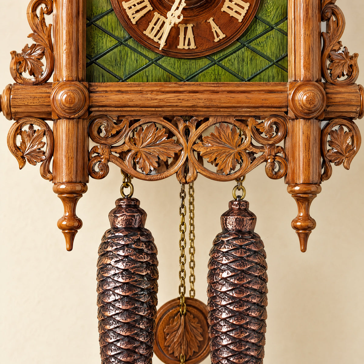 Pine cone weights and chains of an 8-day cuckoo clock Image