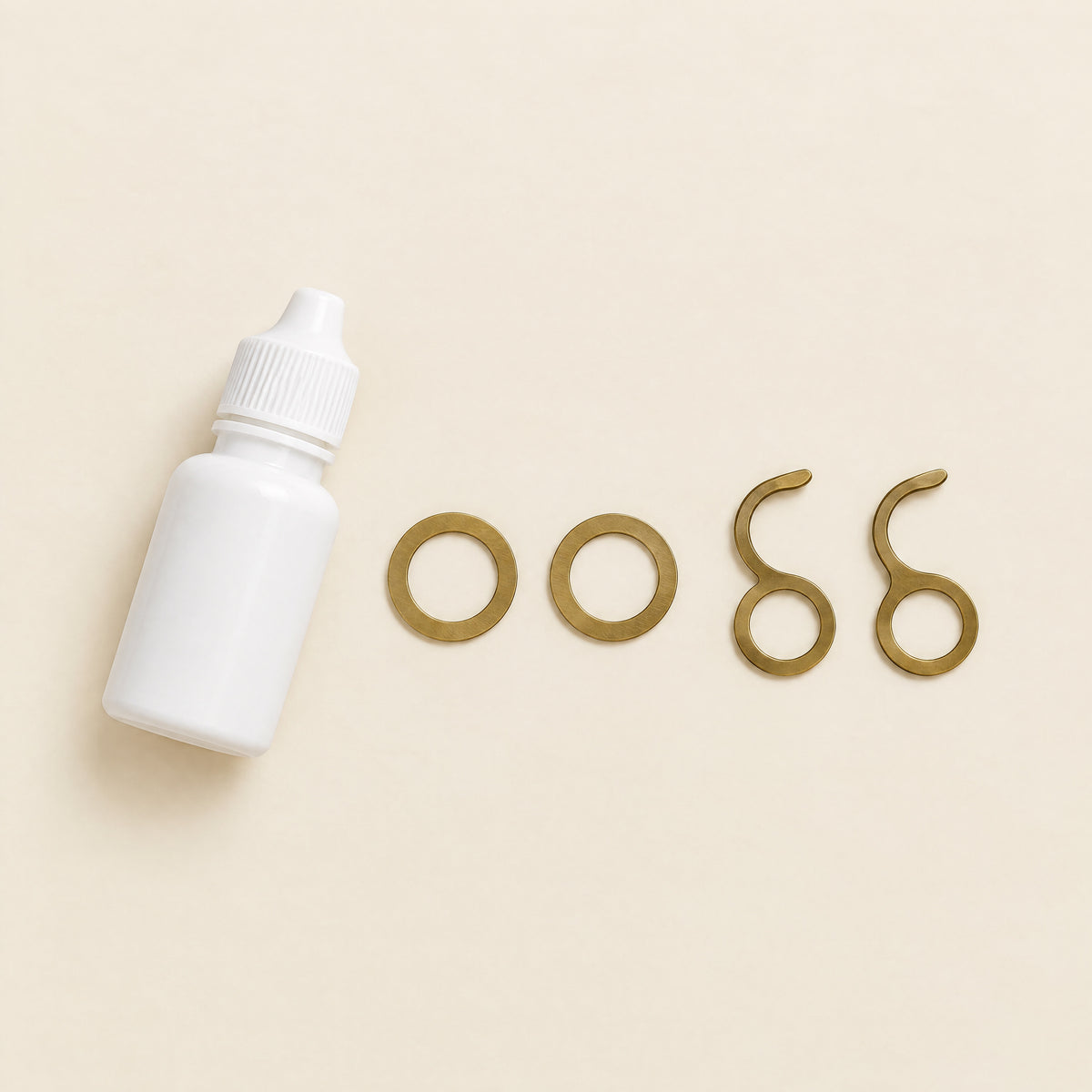 Cuckoo Clock Care Kit: Clock Oil and Chain Hooks, front view