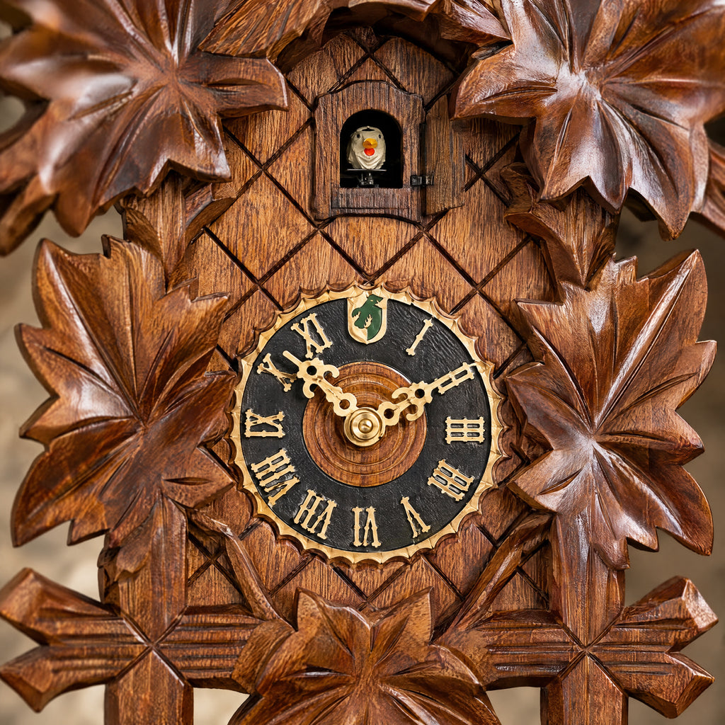 Hönes Lena 8-Day Carved Cuckoo Clock with Night Shut-Off, close-up detail