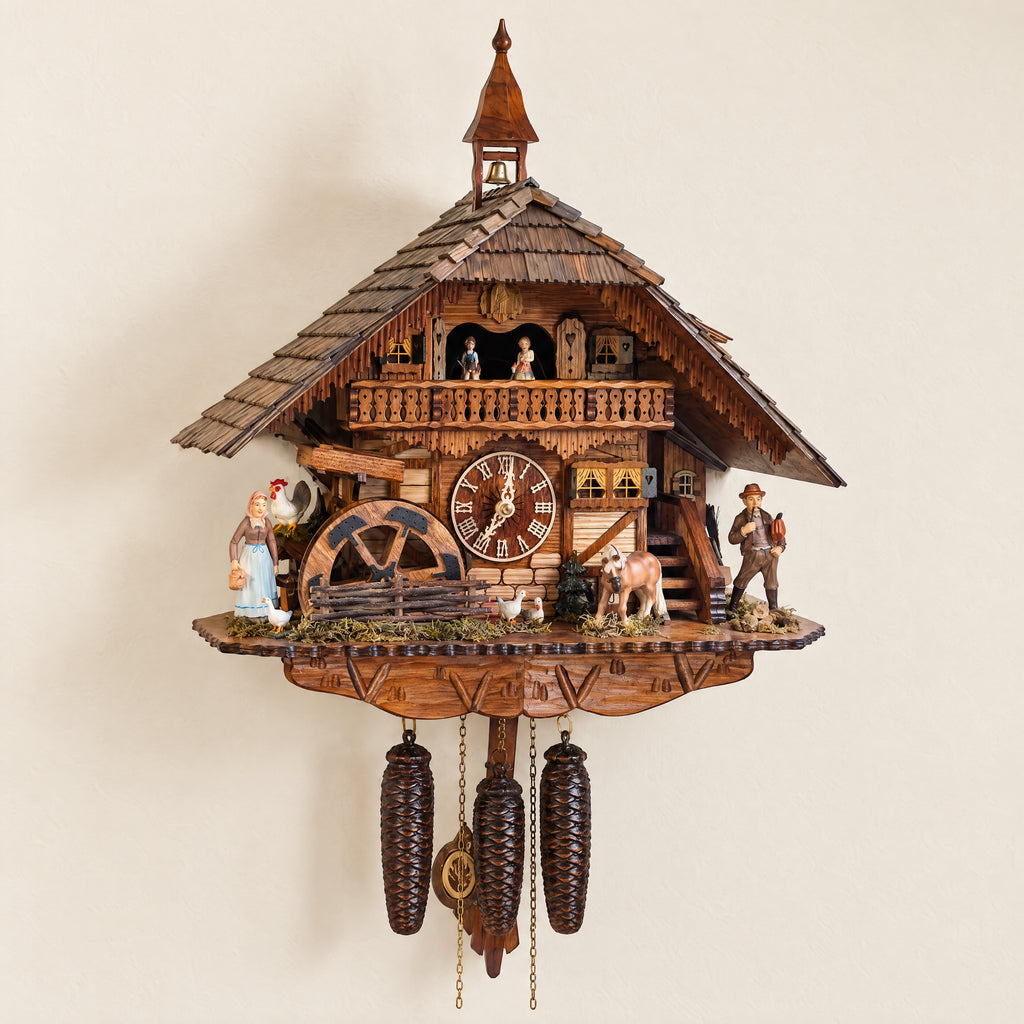 Romba Farmer Couple 8-Day Musical Grand Chalet Cuckoo Clock, front view