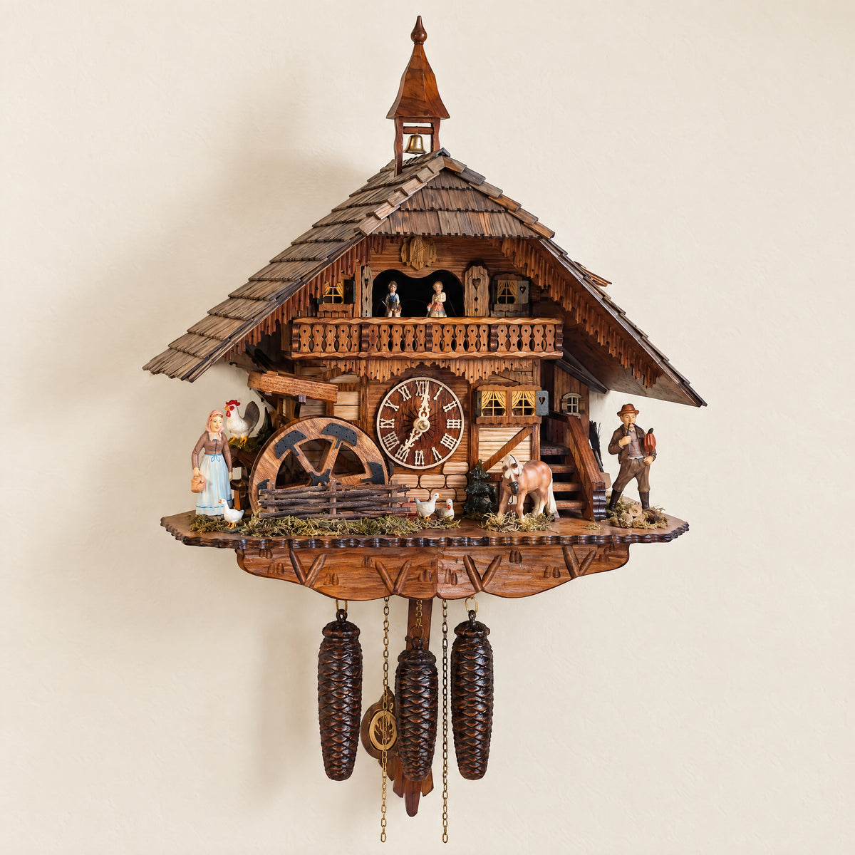Romba Farmer Couple 8-Day Musical Grand Chalet Cuckoo Clock, front view