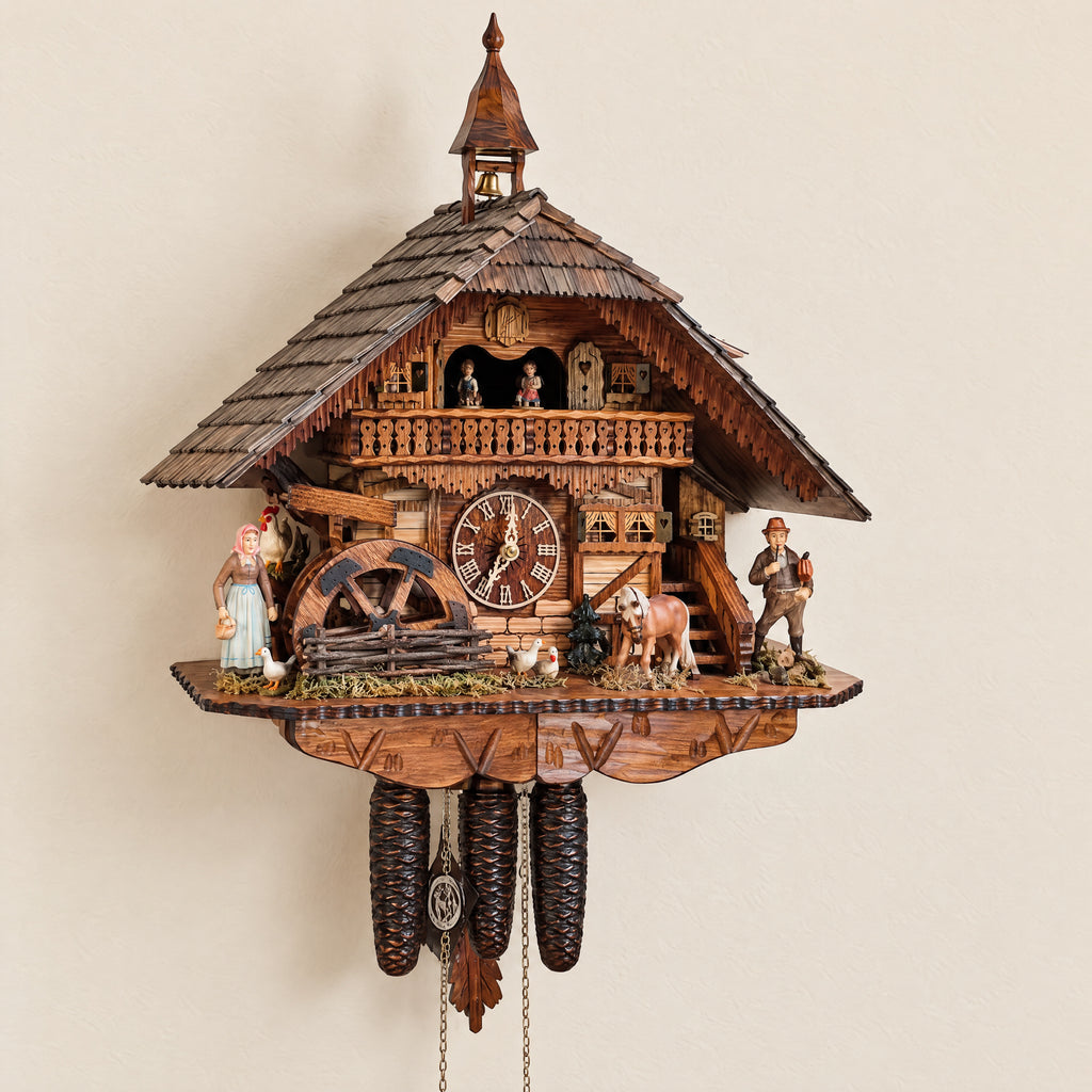 Romba Farmer Couple 8-Day Musical Grand Chalet Cuckoo Clock, three-quarter view